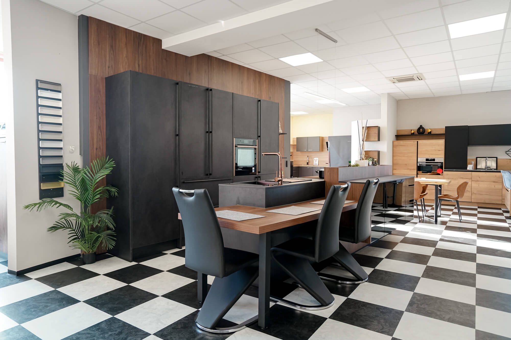 Kuechenstile Haecker Design Inselkueche in Betonoptik grau matt